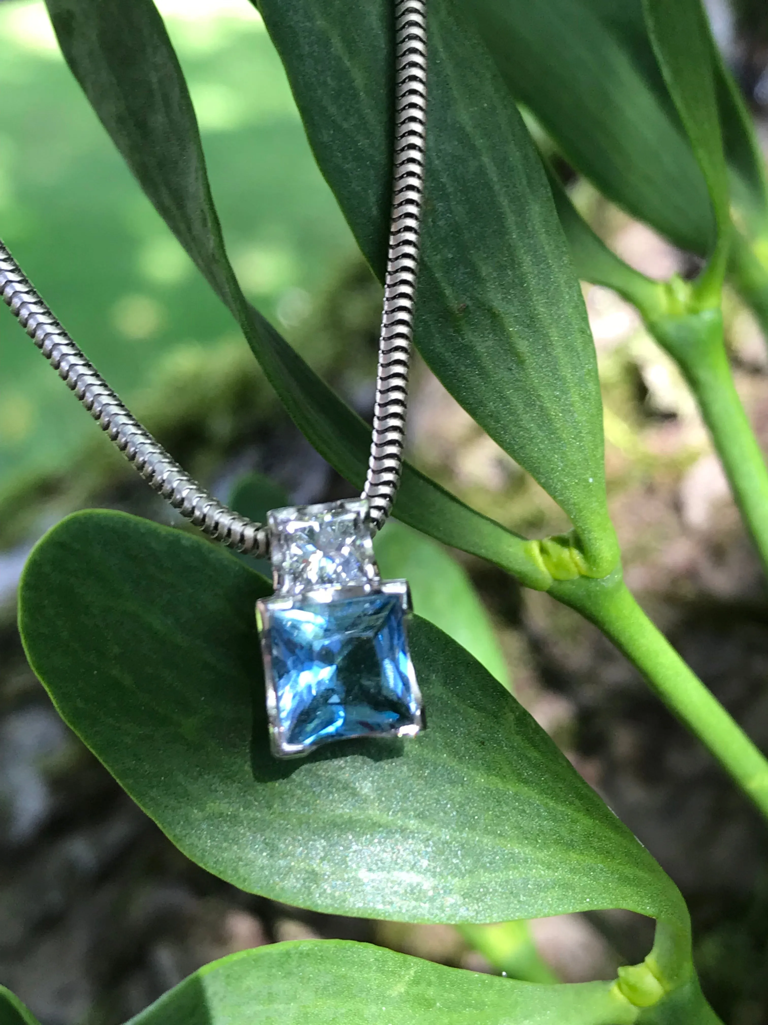 18ct white gold and aquamarine and diamond pendant