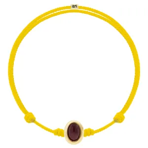 Oval Tiger's Eye Cabochon on Yellow Cord Bracelet