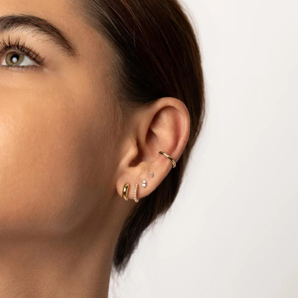 White Topaz Rainbow Huggie Earrings in Gold